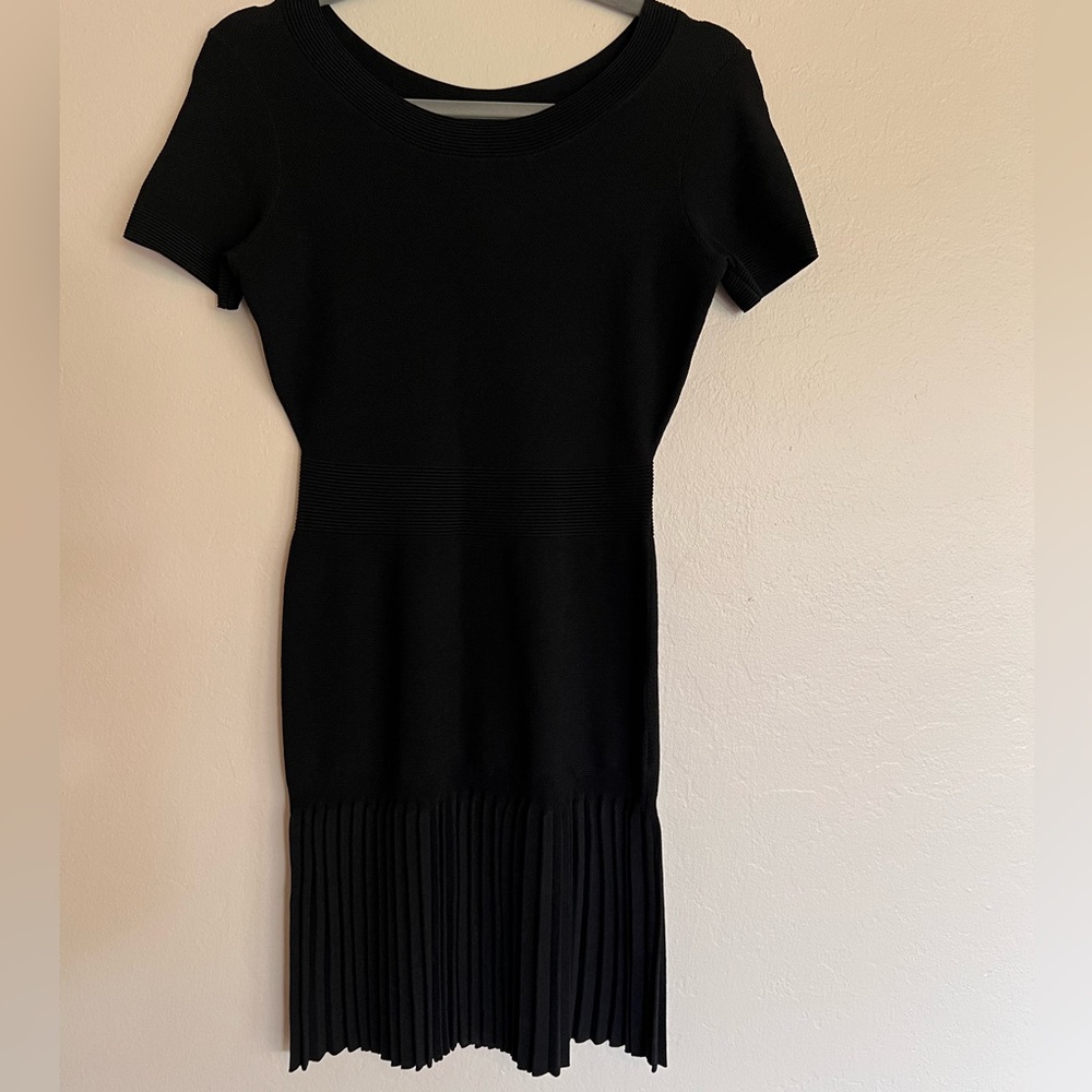 Little black knit dress peekaboo back with pleats